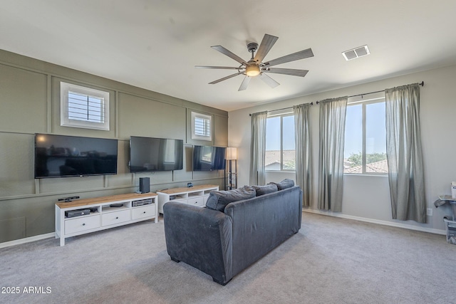 9752 E Torino Ave, Mesa, AZ 85212 - living area with ceiling fan, carpet flooring, and baseboards