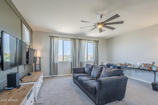 9752 E Torino Ave, Mesa, AZ 85212 - living room with ceiling fan, light colored carpet, and baseboards