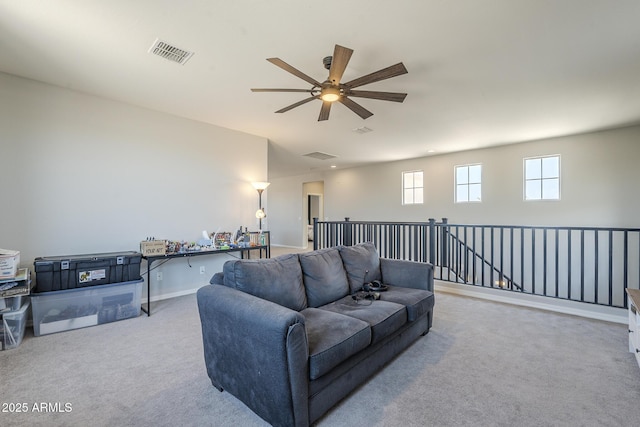9752 E Torino Ave, Mesa, AZ 85212 - living room with carpet flooring, a ceiling fan, and baseboards