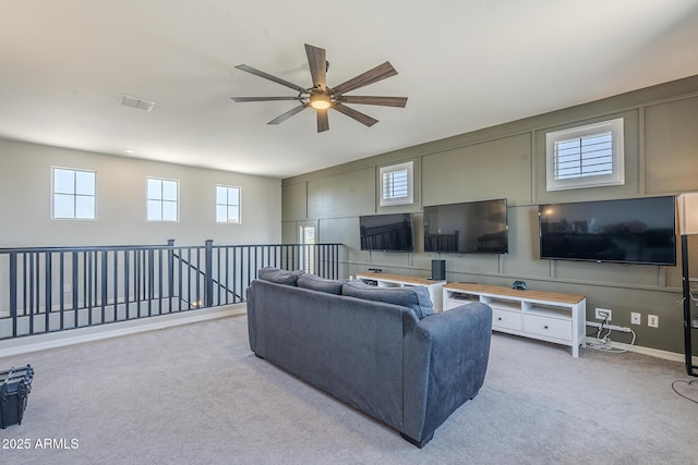9752 E Torino Ave, Mesa, AZ 85212 - living area featuring a ceiling fan, carpet floors, and baseboards