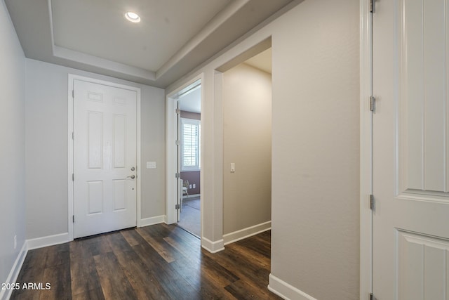 9752 E Torino Ave, Mesa, AZ 85212 - foyer entrance featuring dark wood finished floors, baseboards, a tray ceiling, and recessed lighting