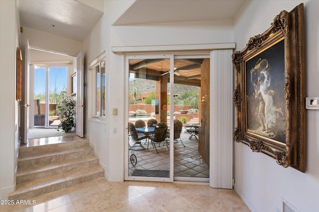 7728 E Mary Sharon Dr, Scottsdale, AZ 85266 - foyer featuring light tile patterned flooring, a ceiling fan, and french doors