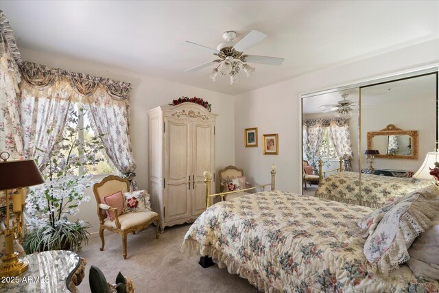7728 E Mary Sharon Dr, Scottsdale, AZ 85266 - bedroom with light colored carpet, a closet, and ceiling fan