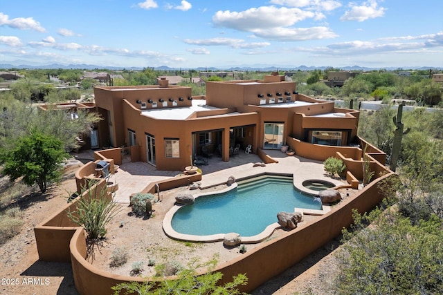 7728 E Mary Sharon Dr, Scottsdale, AZ 85266 - back of property with stucco siding, a mountain view, and a patio area