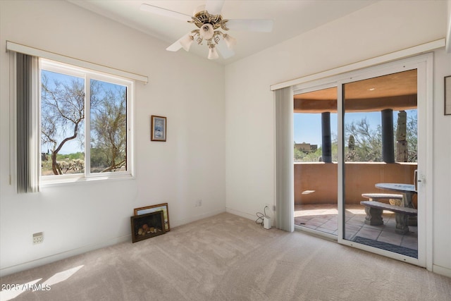 7728 E Mary Sharon Dr, Scottsdale, AZ 85266 - unfurnished room featuring plenty of natural light, carpet flooring, ceiling fan, and baseboards