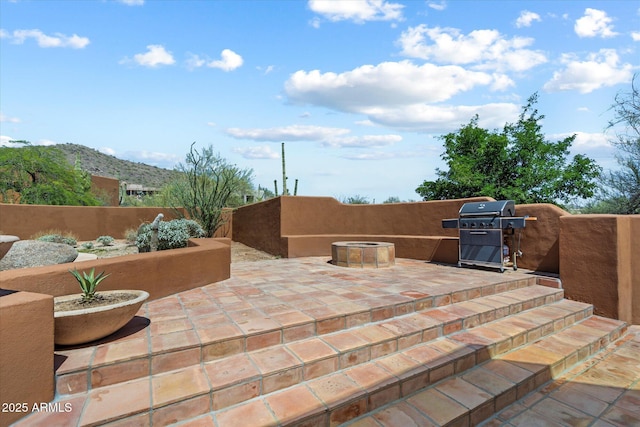 7728 E Mary Sharon Dr, Scottsdale, AZ 85266 - view of patio featuring a grill and a mountain view