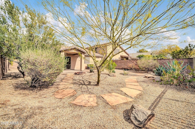 view of yard with a patio and fence