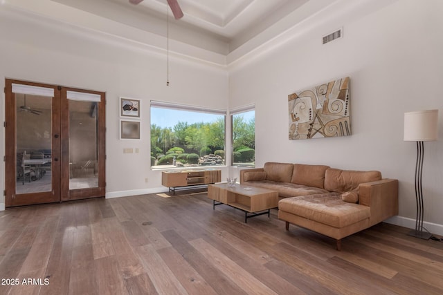 14619 E Desert Vista Trl, Scottsdale, AZ 85262 - living room featuring ceiling fan, wood finished floors, and baseboards