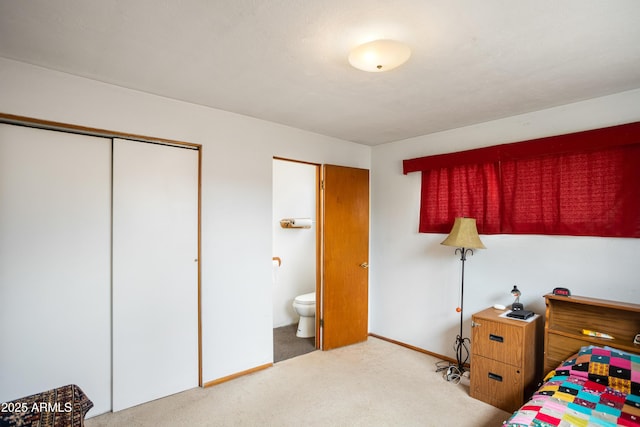 316 B St, Bisbee, AZ 85603 - bedroom with carpet flooring, a closet, and baseboards
