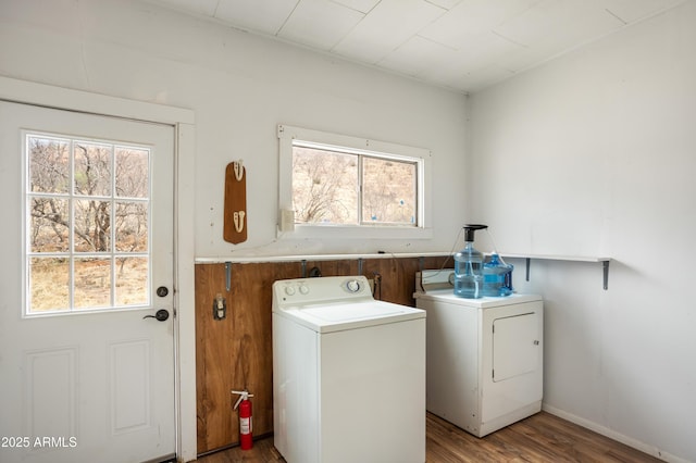316 B St, Bisbee, AZ 85603 - clothes washing area featuring washer and clothes dryer and wood finished floors