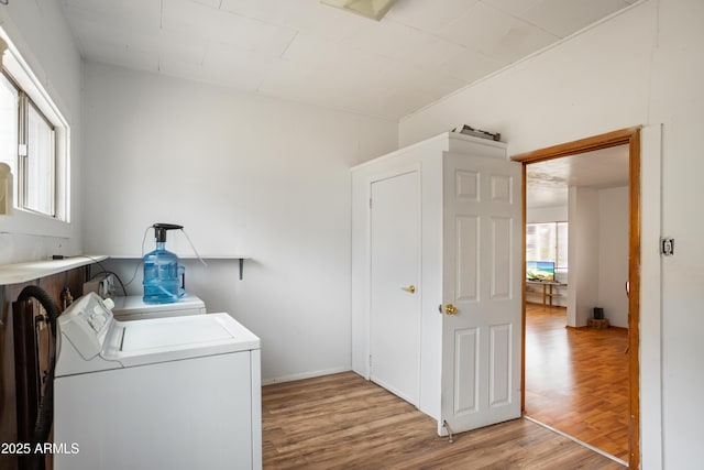 316 B St, Bisbee, AZ 85603 - laundry area featuring washing machine and dryer and light wood-style flooring