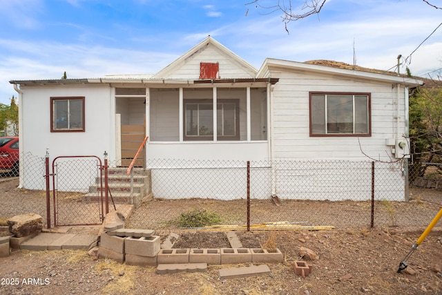 316 B St, Bisbee, AZ 85603 - view of front of home featuring fence and a gate