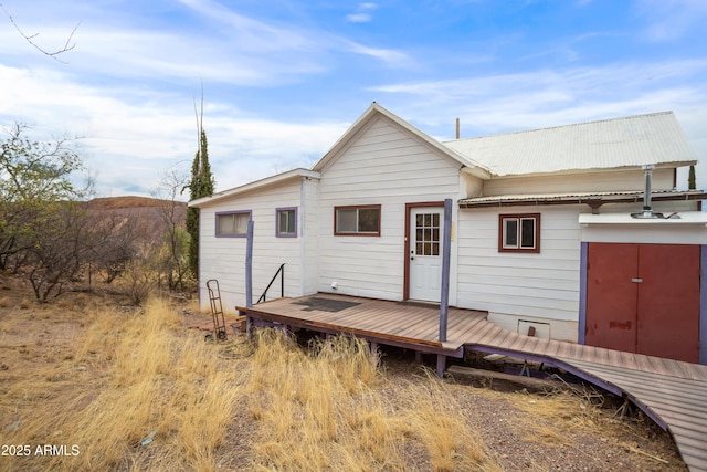 316 B St, Bisbee, AZ 85603 - back of property with a deck and metal roof