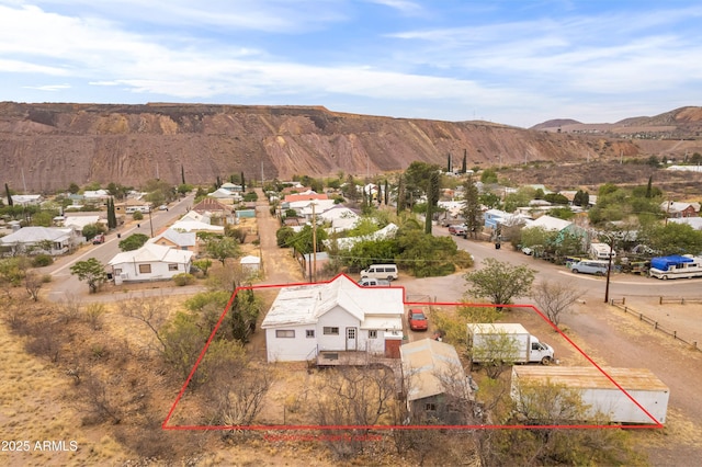 316 B St, Bisbee, AZ 85603 - aerial view of residential area with property parcel outlined and mountains