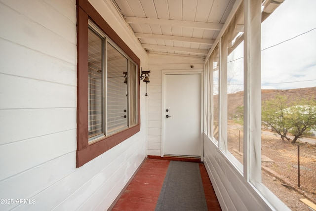 316 B St, Bisbee, AZ 85603 - unfurnished sunroom featuring beamed ceiling