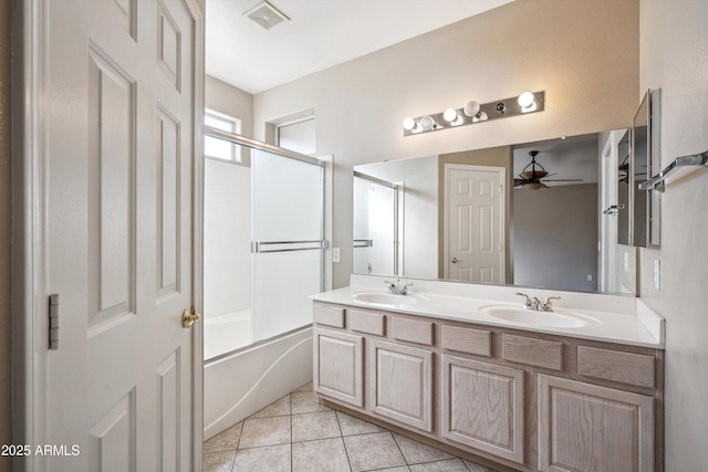 9422 W Monroe St, Peoria, AZ 85345 - bathroom with a ceiling fan, double vanity, tile patterned flooring, and shower / bath combination