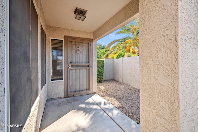 9422 W Monroe St, Peoria, AZ 85345 - entrance to property featuring stucco siding and a patio