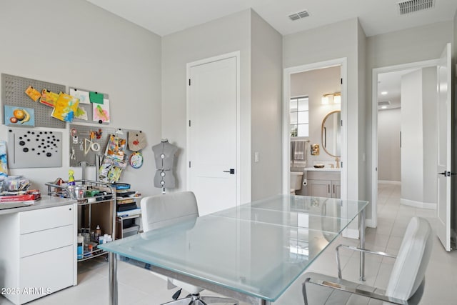 20797 W Rattler Rd, Buckeye, AZ 85396 - office with light tile patterned floors and a sink