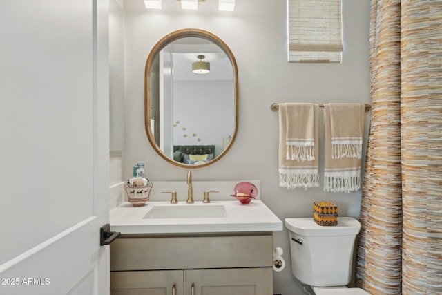 20797 W Rattler Rd, Buckeye, AZ 85396 - full bath with toilet, vanity, and a shower with shower curtain