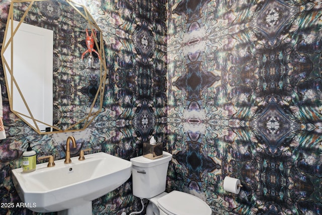20797 W Rattler Rd, Buckeye, AZ 85396 - bathroom featuring a sink and toilet