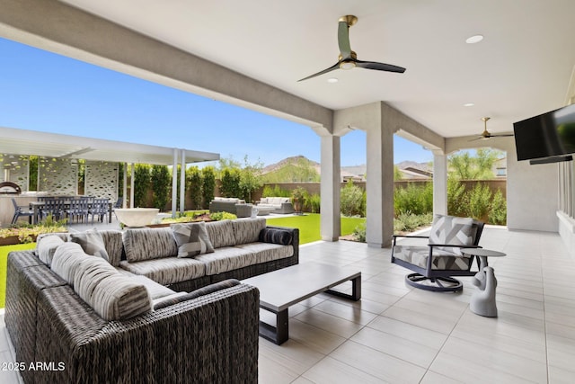 20797 W Rattler Rd, Buckeye, AZ 85396 - view of patio / terrace featuring an outdoor hangout area, ceiling fan, and outdoor dining space