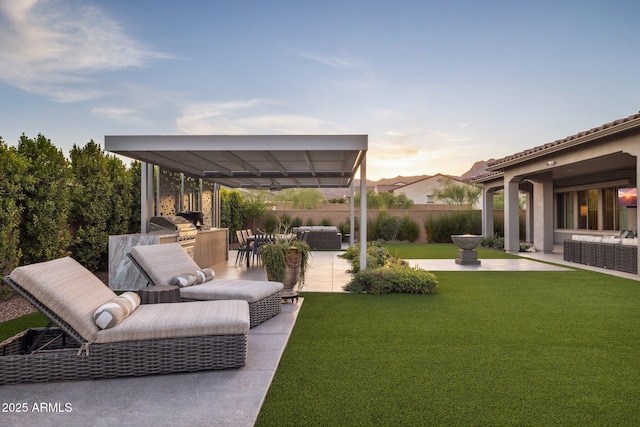 20797 W Rattler Rd, Buckeye, AZ 85396 - view of yard featuring an outdoor living space, a patio area, a gazebo, and an outdoor kitchen