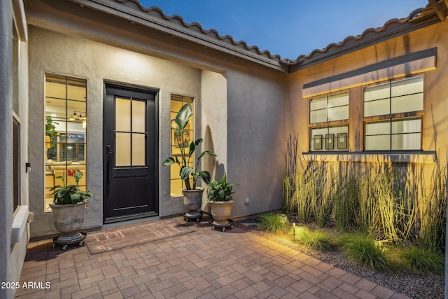 20797 W Rattler Rd, Buckeye, AZ 85396 - entrance to property with stucco siding and a patio area