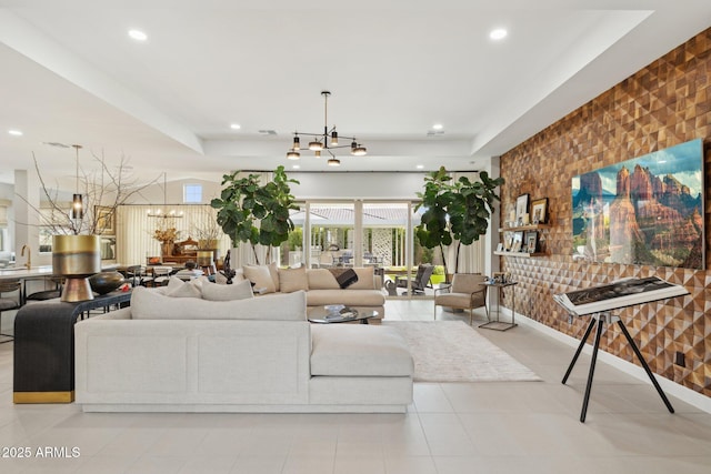 20797 W Rattler Rd, Buckeye, AZ 85396 - tiled living room featuring a chandelier, recessed lighting, a sink, and a tray ceiling