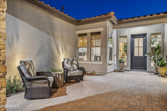 20797 W Rattler Rd, Buckeye, AZ 85396 - entrance to property with a patio area and stucco siding