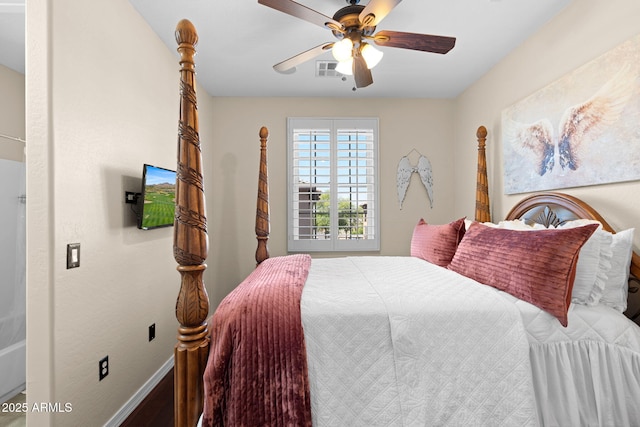 bedroom with a ceiling fan, baseboards, visible vents, and wood finished floors