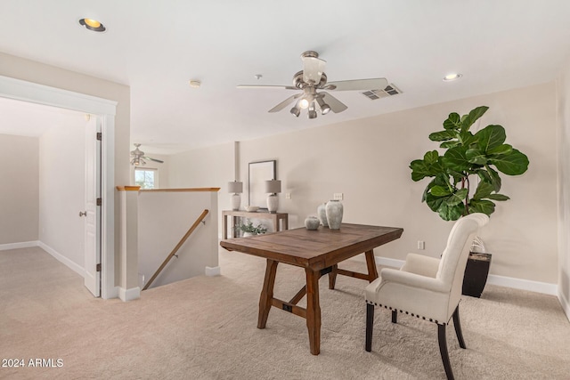 home office with light colored carpet and ceiling fan