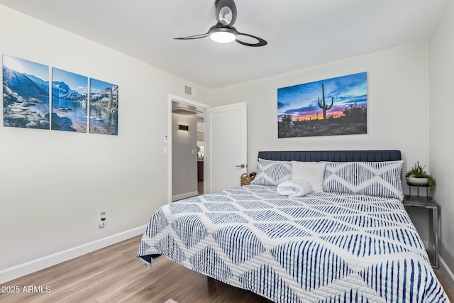 bedroom featuring wood-type flooring and ceiling fan