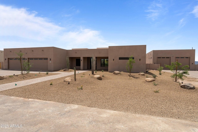 39302 N 30th Dr, Phoenix, AZ 85086 - adobe home featuring stucco siding and a garage