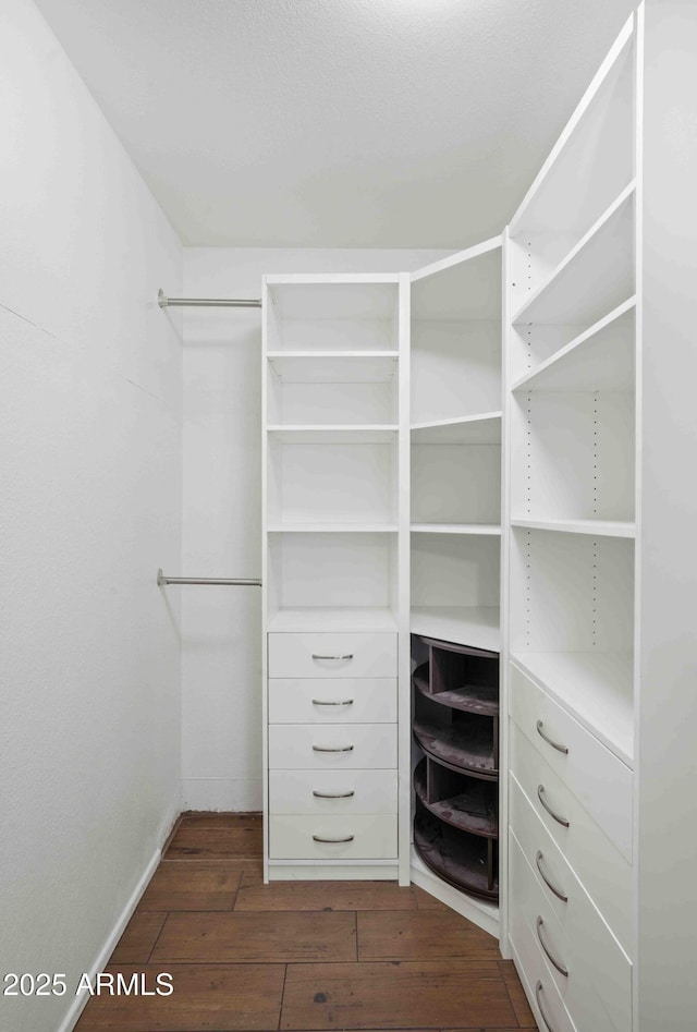 1158 N Barkley St, Mesa, AZ 85203 - spacious closet with dark wood-type flooring