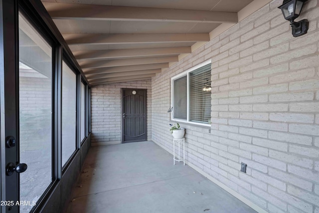 1158 N Barkley St, Mesa, AZ 85203 - unfurnished sunroom featuring beamed ceiling