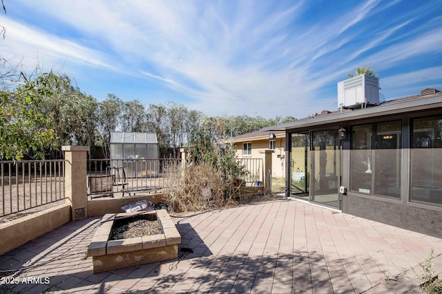 1158 N Barkley St, Mesa, AZ 85203 - view of patio with an outdoor fire pit and a wooden deck