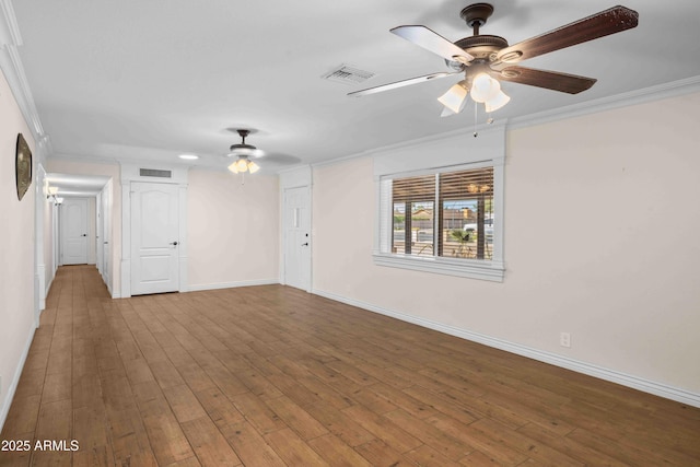1158 N Barkley St, Mesa, AZ 85203 - unfurnished room with ceiling fan, crown molding, and wood finished floors