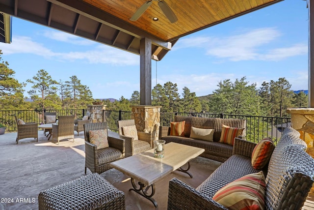 view of patio with an outdoor hangout area and ceiling fan