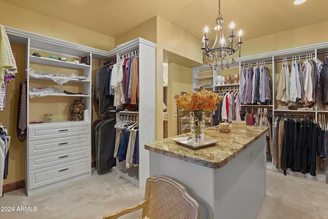 walk in closet featuring light colored carpet