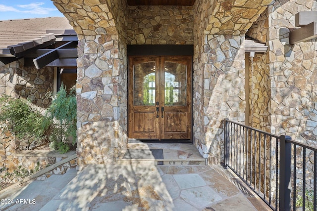 entrance to property with french doors