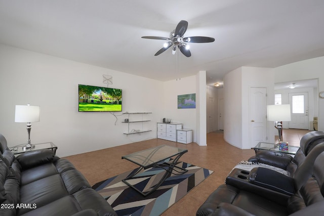 living area featuring ceiling fan