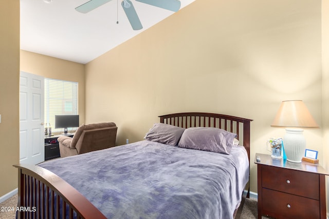 bedroom featuring lofted ceiling, carpet flooring, and ceiling fan