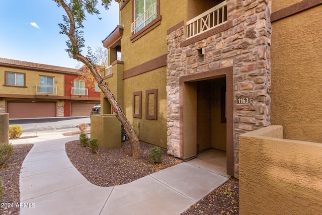 view of building exterior featuring a garage