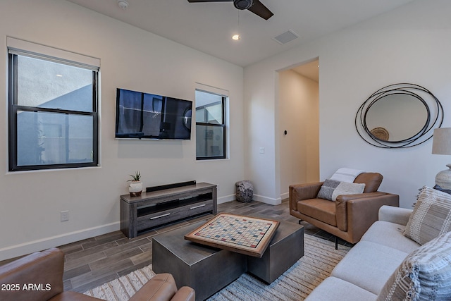 living room with ceiling fan