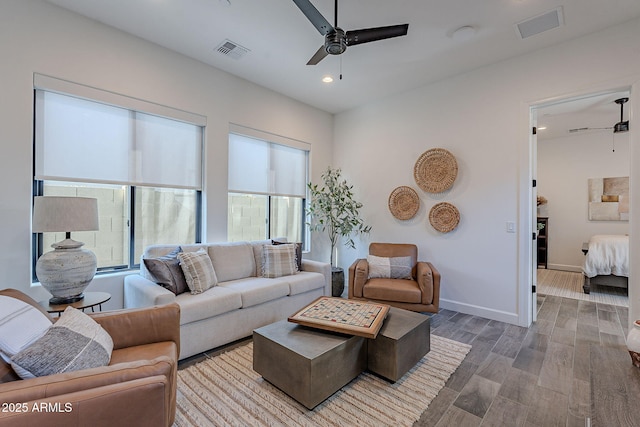 living room with ceiling fan