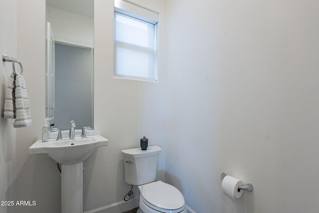 bathroom featuring toilet