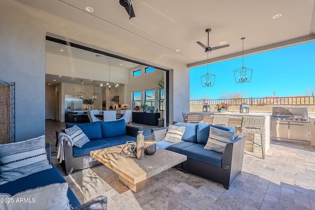 view of patio / terrace with ceiling fan, an outdoor bar, an outdoor hangout area, and area for grilling