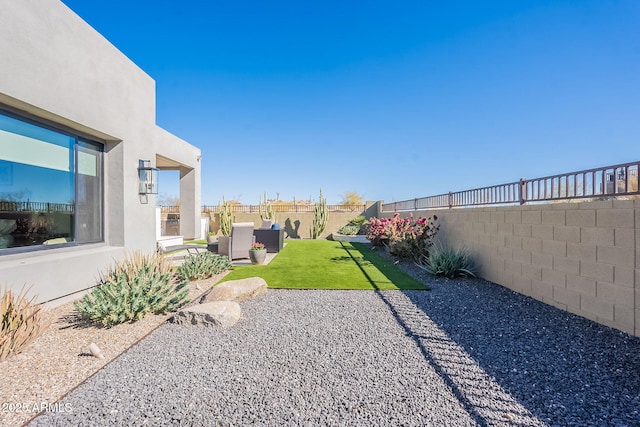 view of yard with a patio and outdoor lounge area