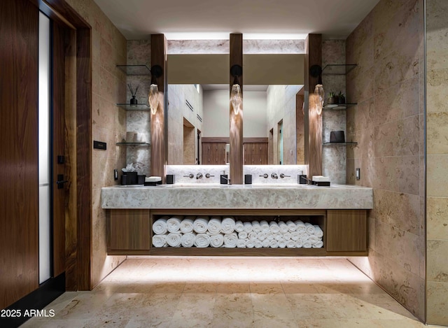 bathroom featuring tile walls and vanity