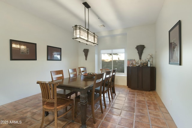 dining room with tile patterned flooring